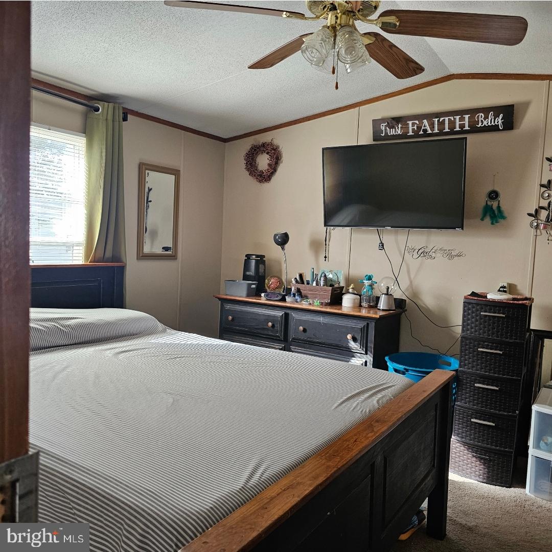 2 New Bridge Road, Unit C3 Salem, NJ 08079 - Photo 6 of 14 a bedroom with a bed and a flat screen tv