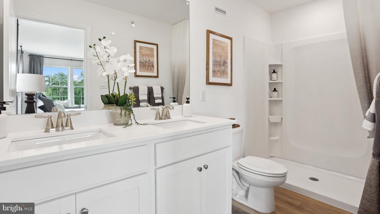 282 Derby Drive Exton, PA 19341 - Photo 19 of 31 a bathroom with a sink a toilet and shower