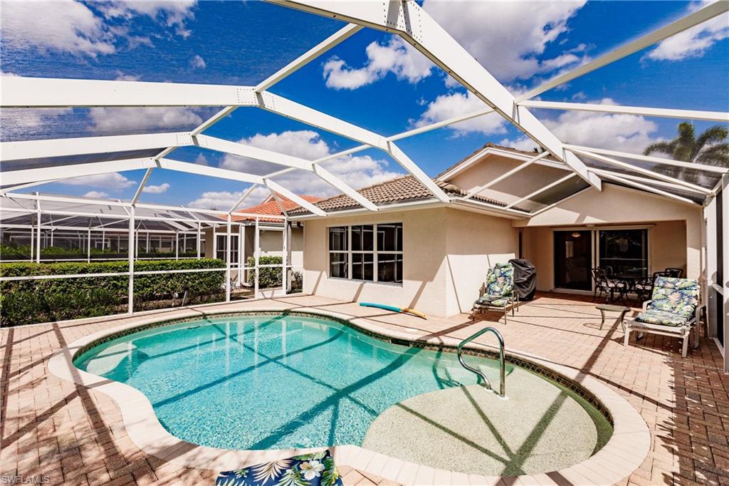 19628 Villa Rosa Loop Estero, FL 33967 - Photo 1 of 25 a view of a house with swimming pool and sitting area