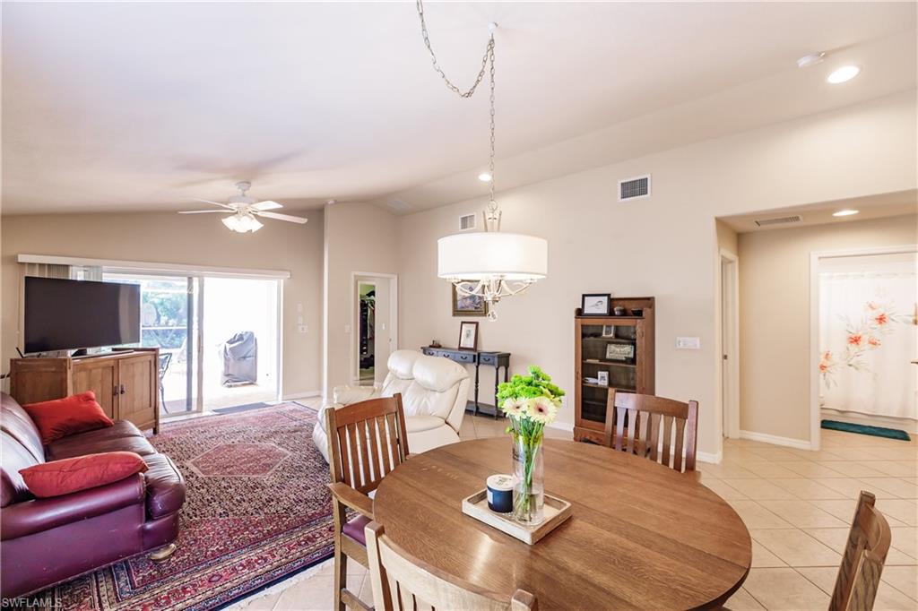 19628 Villa Rosa Loop Estero, FL 33967 - Photo 12 of 25 a view of a dining room with furniture