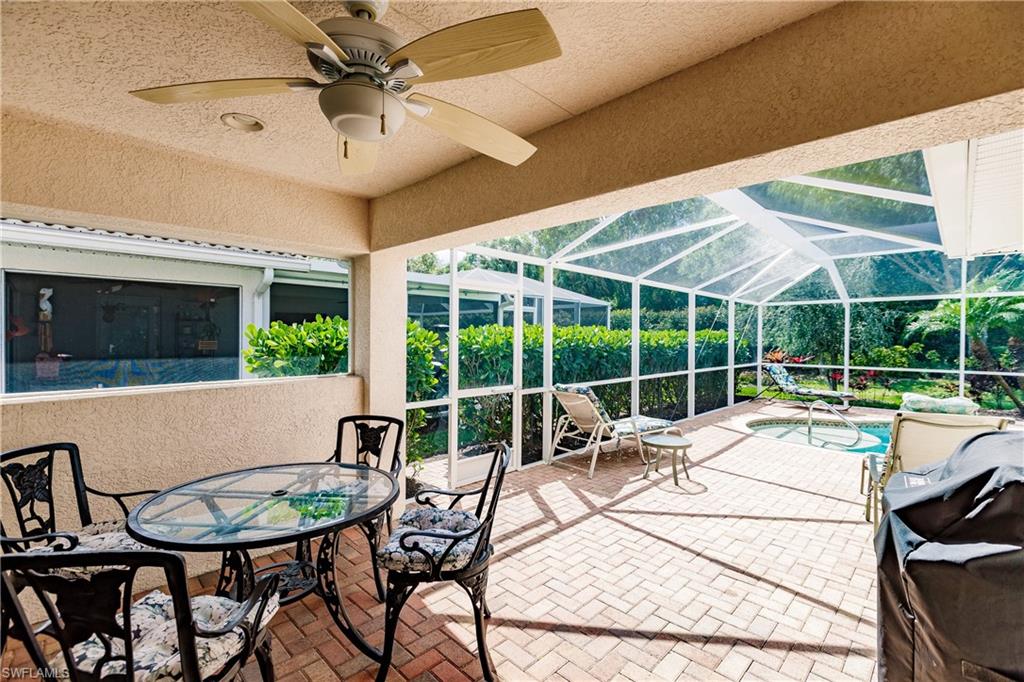 19628 Villa Rosa Loop Estero, FL 33967 - Photo 22 of 25 a view of a dining room with furniture window and outside view