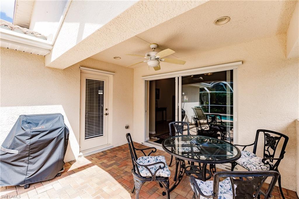 19628 Villa Rosa Loop Estero, FL 33967 - Photo 23 of 25 a view of a dining room with furniture window and outside view