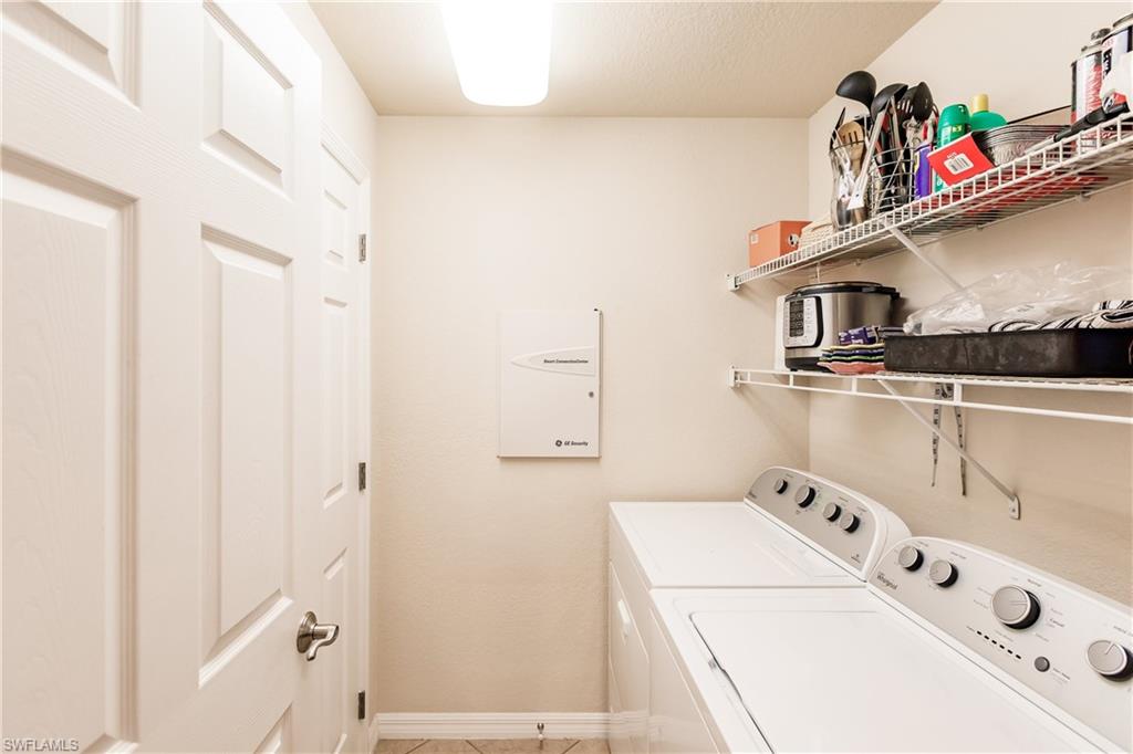 19628 Villa Rosa Loop Estero, FL 33967 - Photo 9 of 25 a utility room with dryer and washer