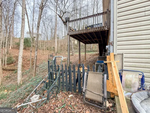 a view of a balcony with chairs
