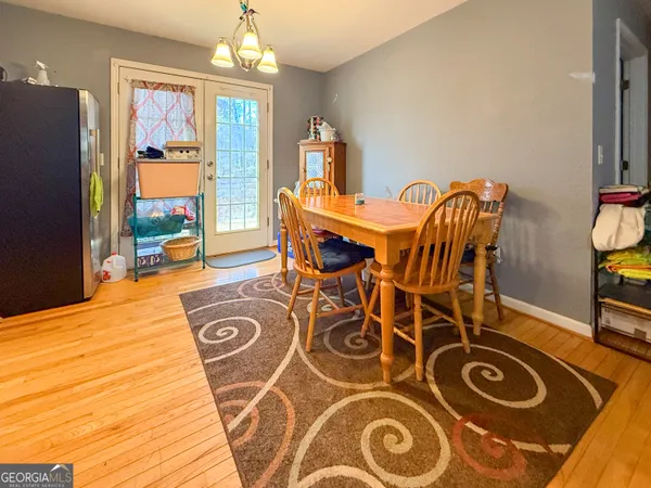 a view of a dining room with furniture