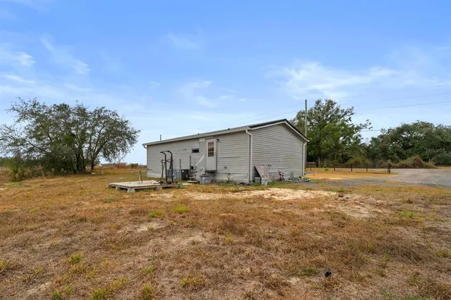 a backyard of house with green space