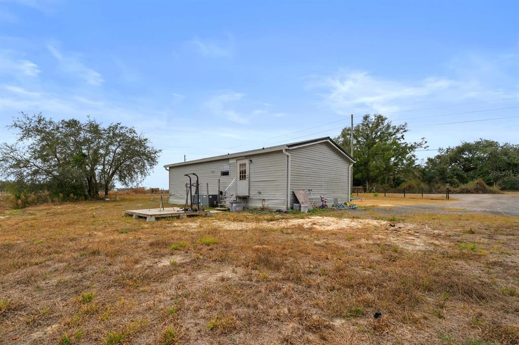 17558 Caufield Road Spring Hill, FL 34610 - Photo 16 of 20 a backyard of house with green space