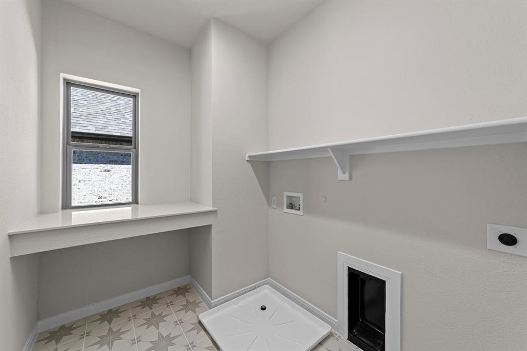 2044 Cuellar Way Van Alstyne, TX 75495 - Photo 9 of 30 a view of an empty room with windows