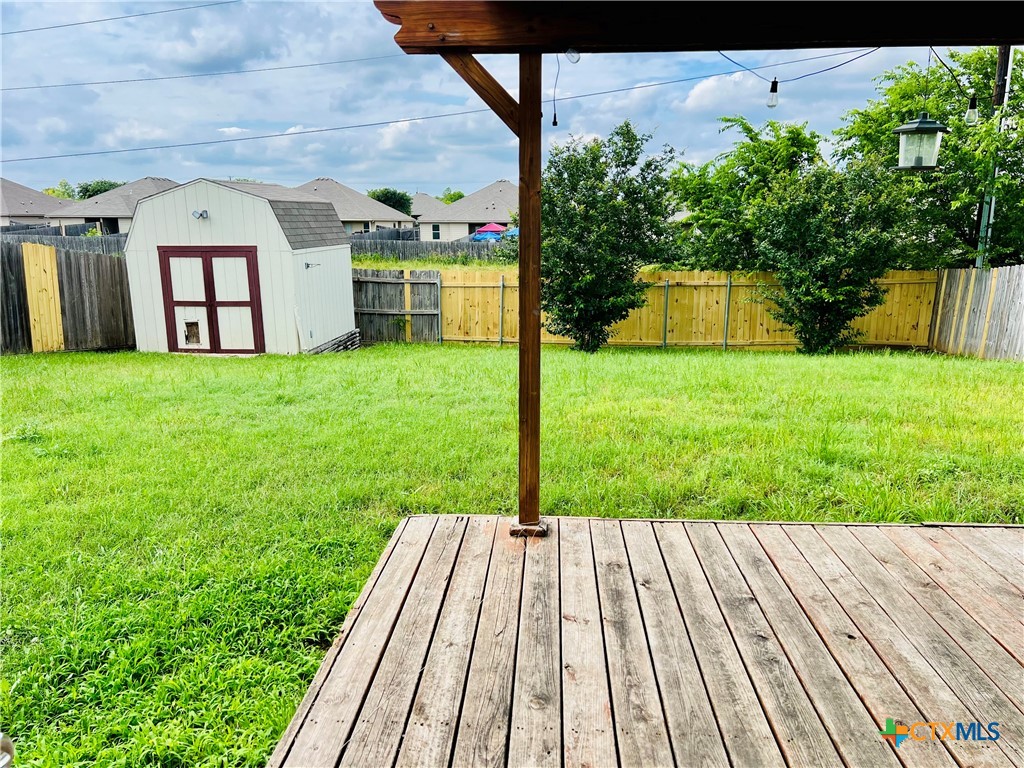8210 Sunset Trail Temple, TX 76502 - Photo 15 of 15 a view of backyard with a garden and plants