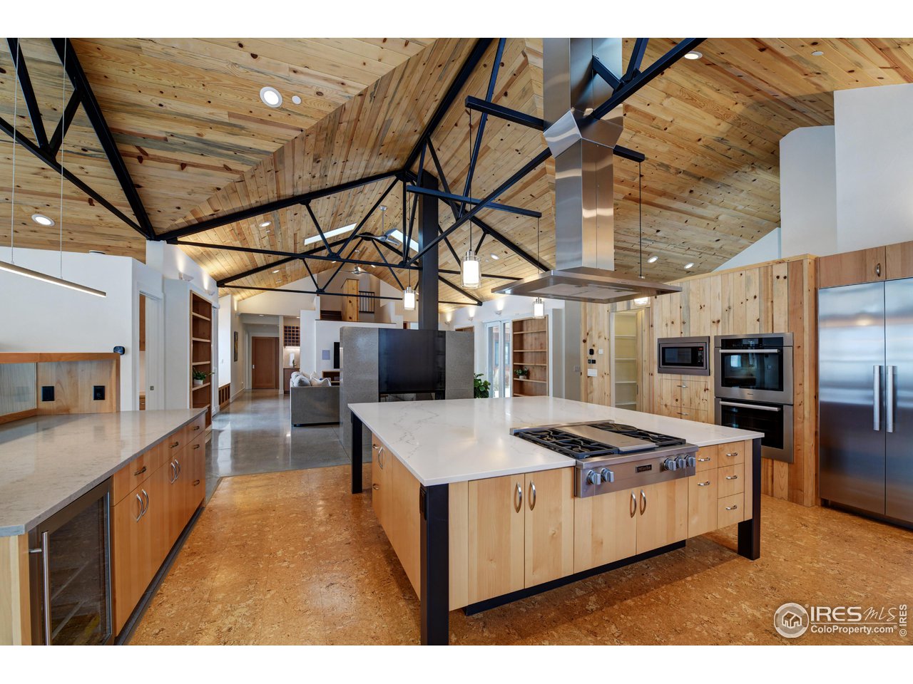 6077 Jay Road Boulder, CO 80301 - Photo 10 of 35 a kitchen with stainless steel appliances granite countertop a sink a stove and a refrigerator