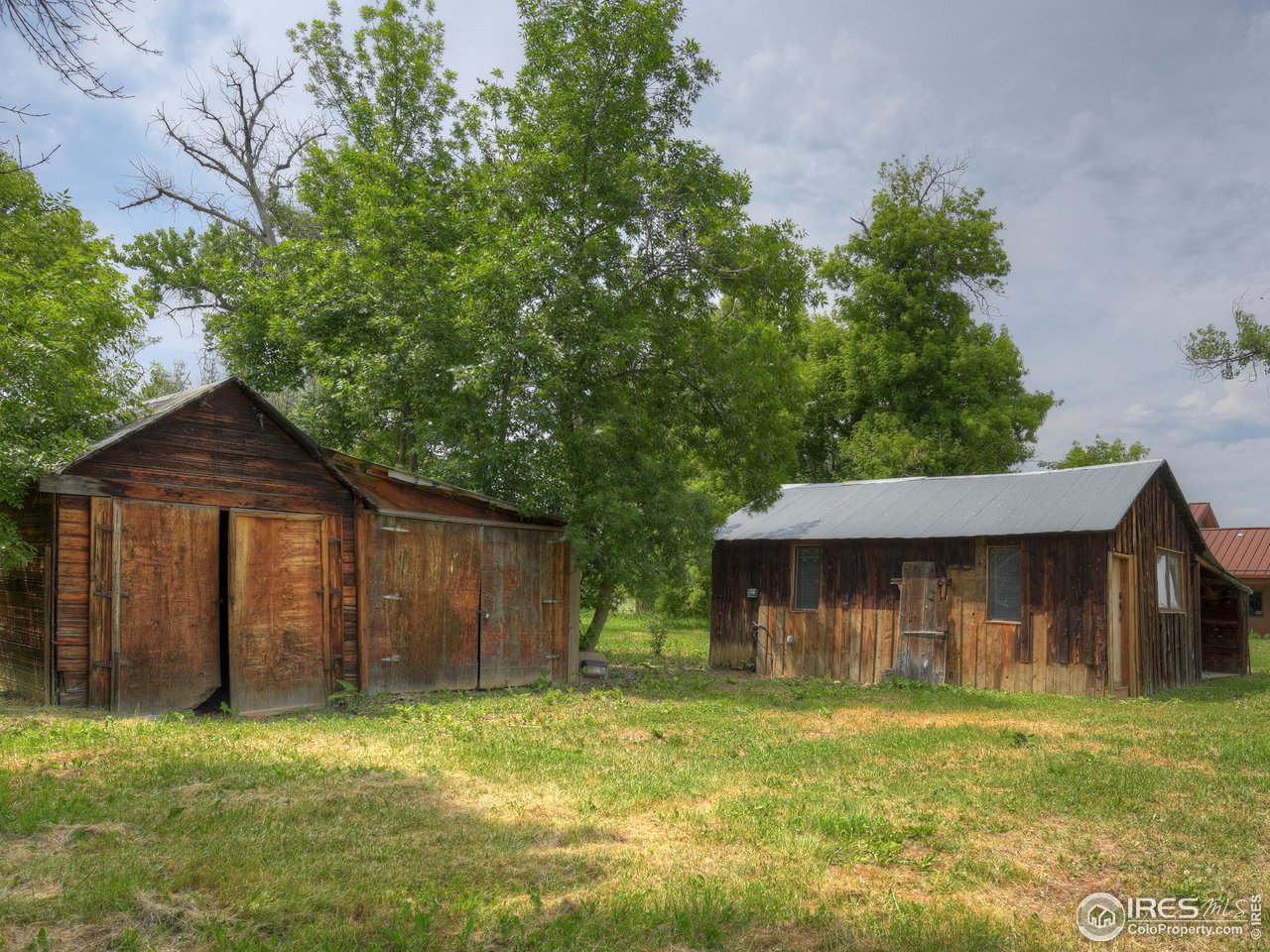 6077 Jay Road Boulder, CO 80301 - Photo 29 of 35 a front view of a house with a yard