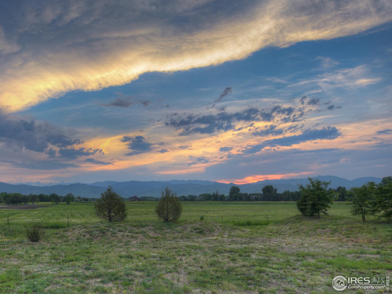 6077 Jay Road Boulder, CO 80301 - Photo 32 of 35 a view of a lake with a yard