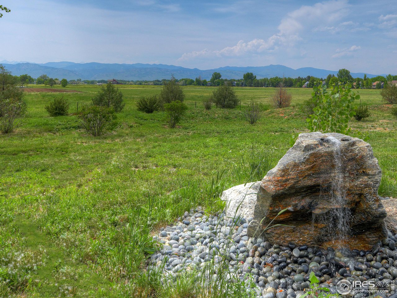 6077 Jay Road Boulder, CO 80301 - Photo 33 of 35 a view of a lush green outdoor space with a lake view