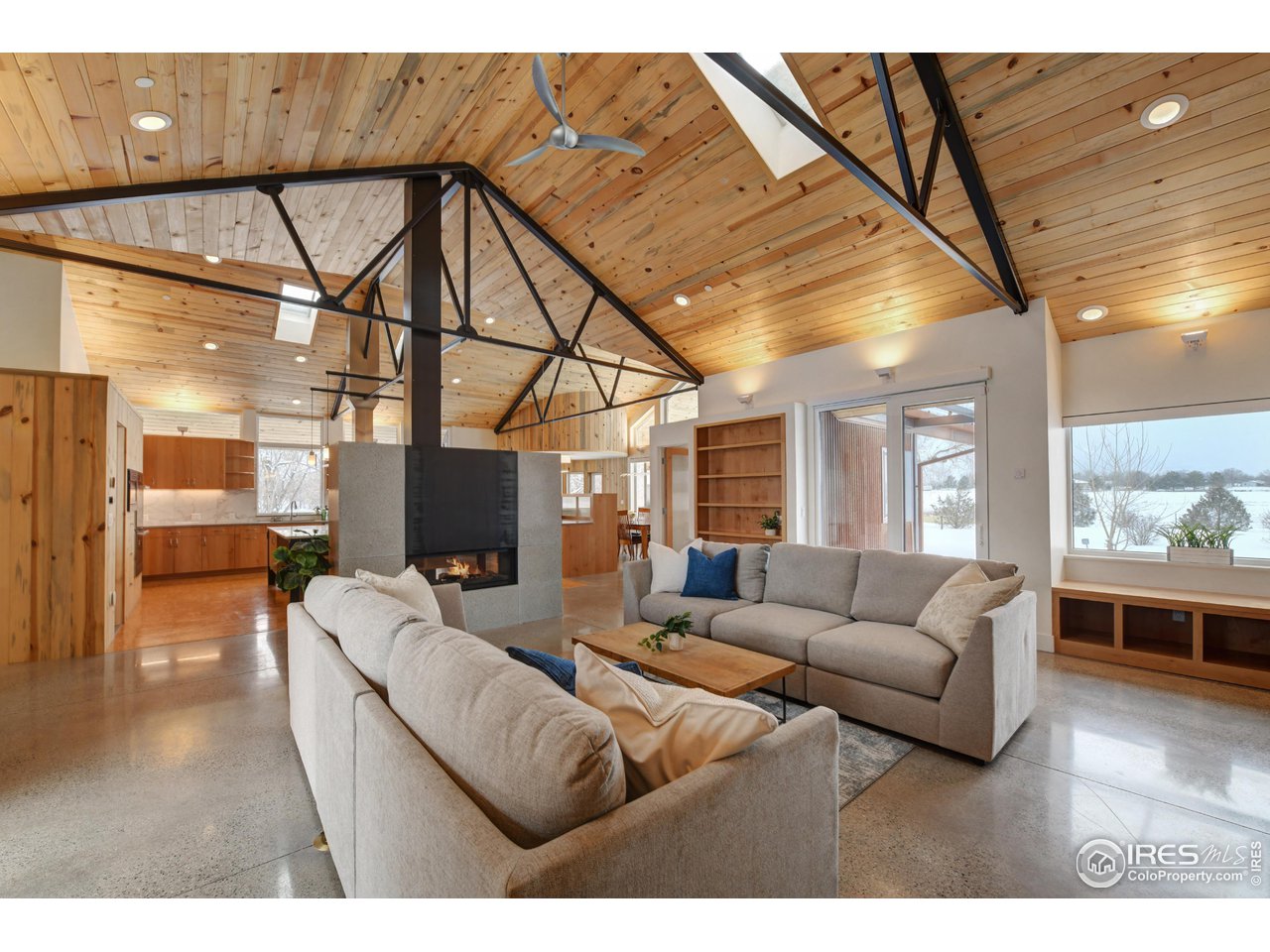 6077 Jay Road Boulder, CO 80301 - Photo 35 of 35 a living room with furniture a wooden floor and next to a window