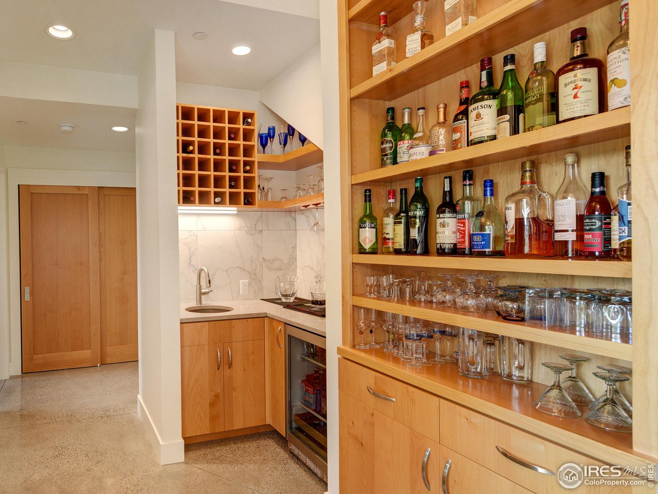 6077 Jay Road Boulder, CO 80301 - Photo 8 of 35 a view of a kitchen with fridge and rack