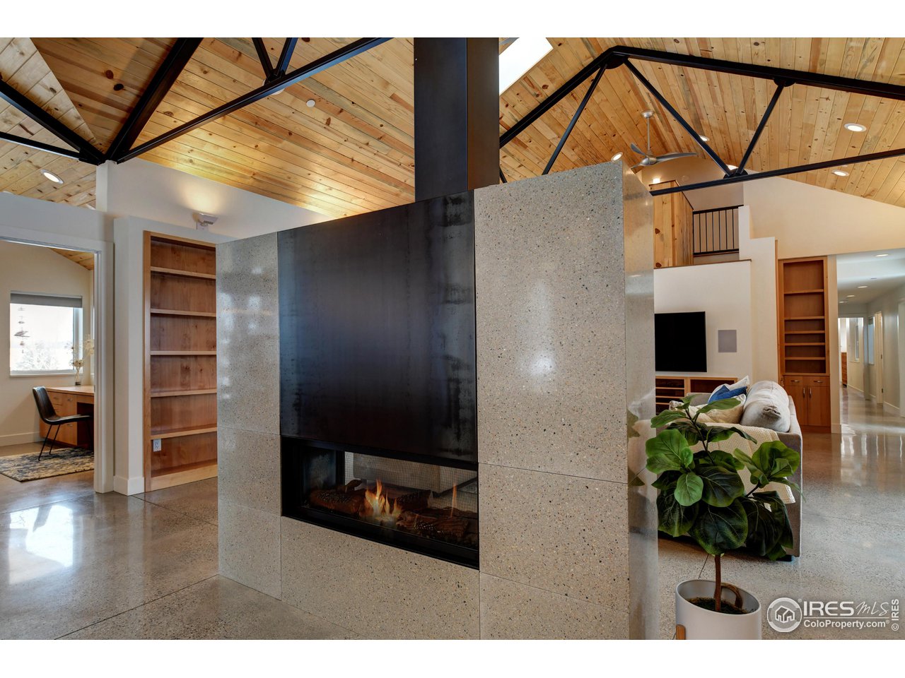 6077 Jay Road Boulder, CO 80301 - Photo 9 of 35 a living room with furniture and a flat screen tv