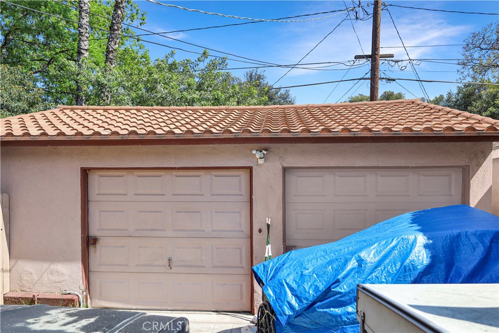 7442 Potomac Street Riverside, CA 92504 - Photo 7 of 7 a view of a wooden door of the house