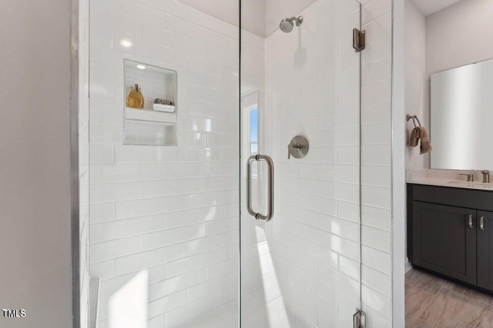 509 Kildaire Farm Road, Unit 303 Cary, NC 27511 - Photo 20 of 32 PRimary bath 3