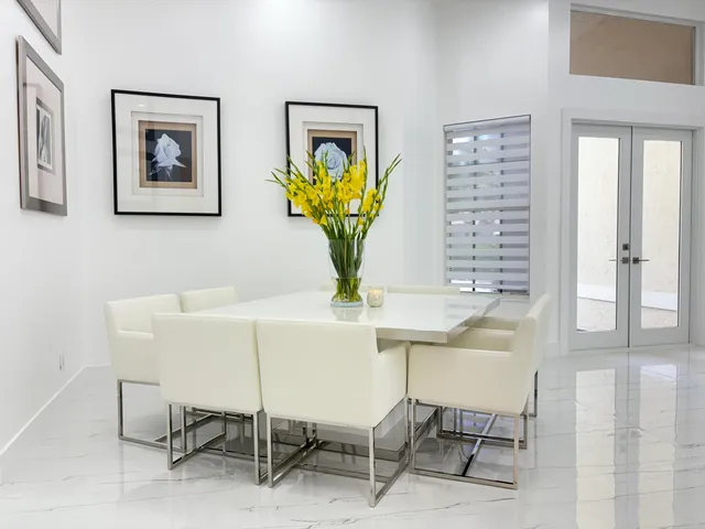 a view of a dining room with furniture