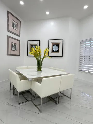 a view of a kitchen with a stove and a large window