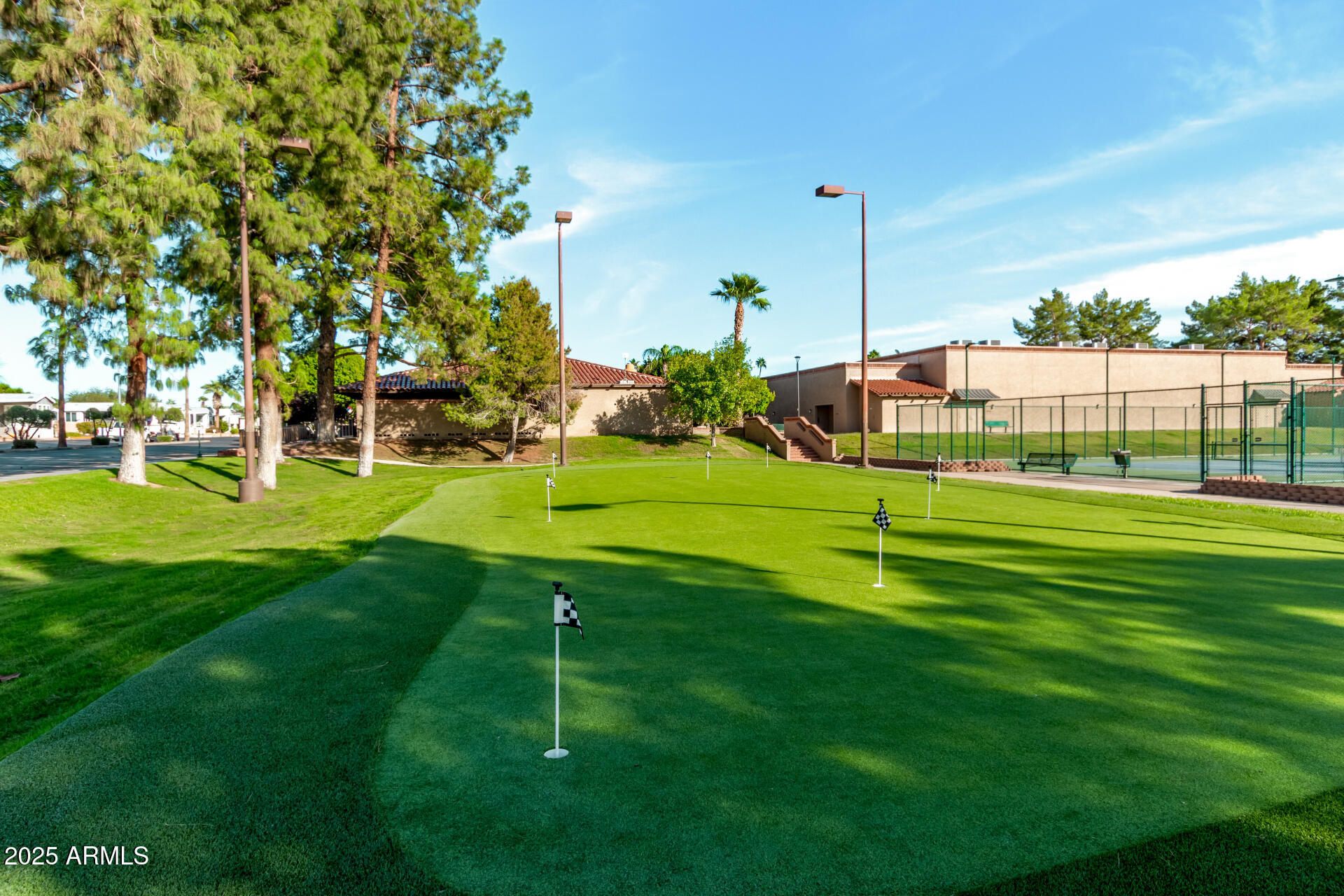 111 South Greenfield Road, Unit 647 Mesa, AZ 85206 - Photo 20 of 29 a view of a park with swings and a yard