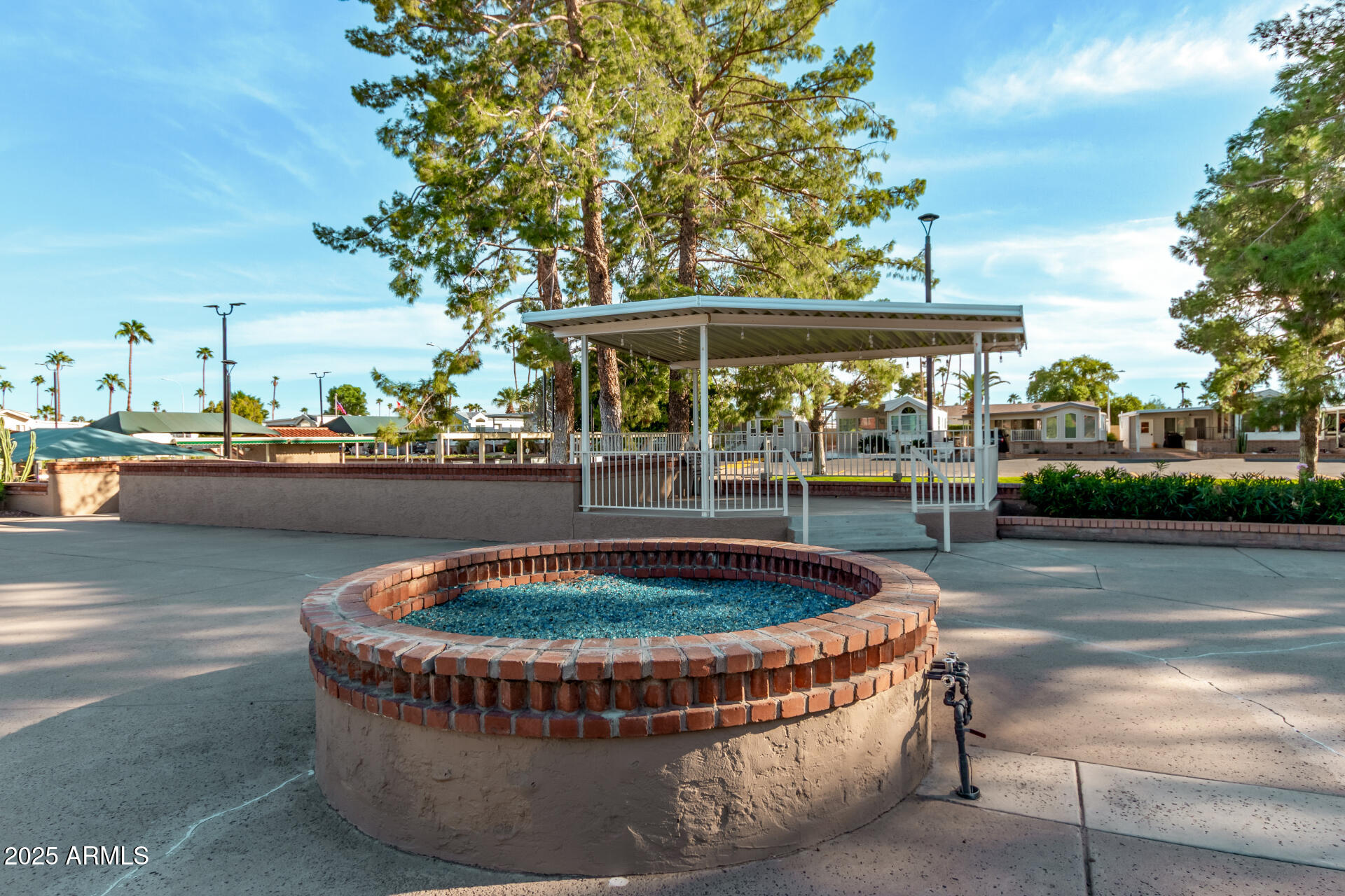111 South Greenfield Road, Unit 647 Mesa, AZ 85206 - Photo 25 of 29 a view of a swimming pool with a patio