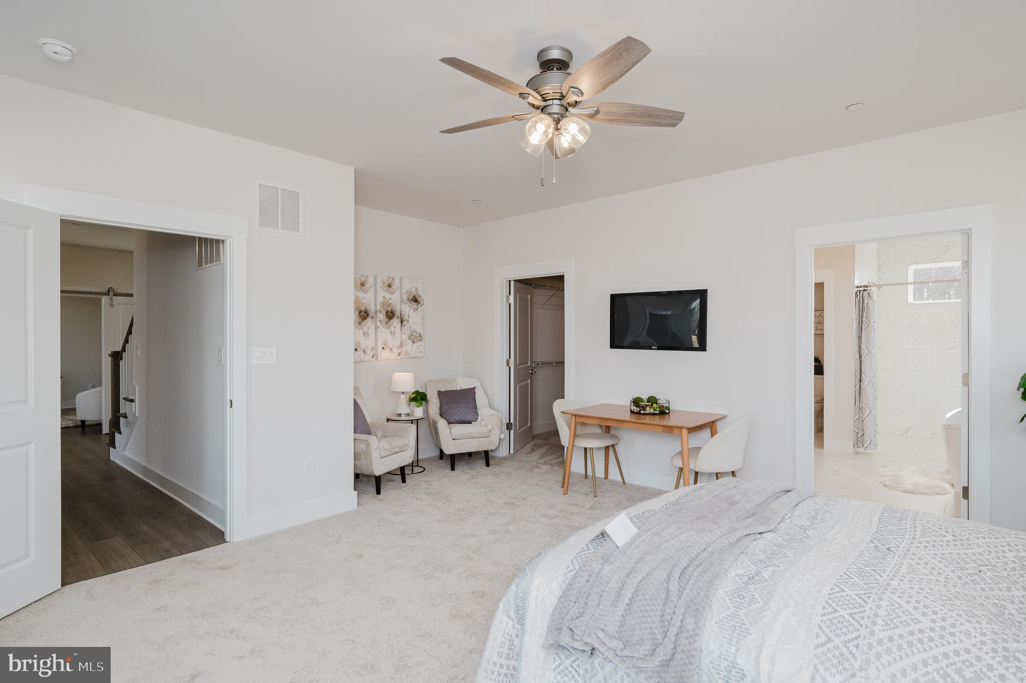 1605 A Oakland Road Freeland, MD 21053 - Photo 24 of 32 a bedroom with a bed and a chandelier