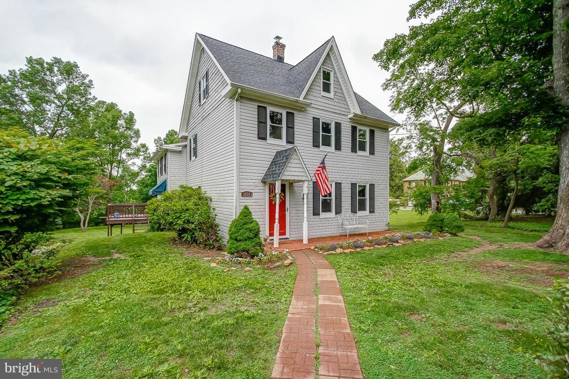 2429 Stanwick Road Phoenix, MD 21131 - Photo 1 of 30 a front view of house with yard and green space
