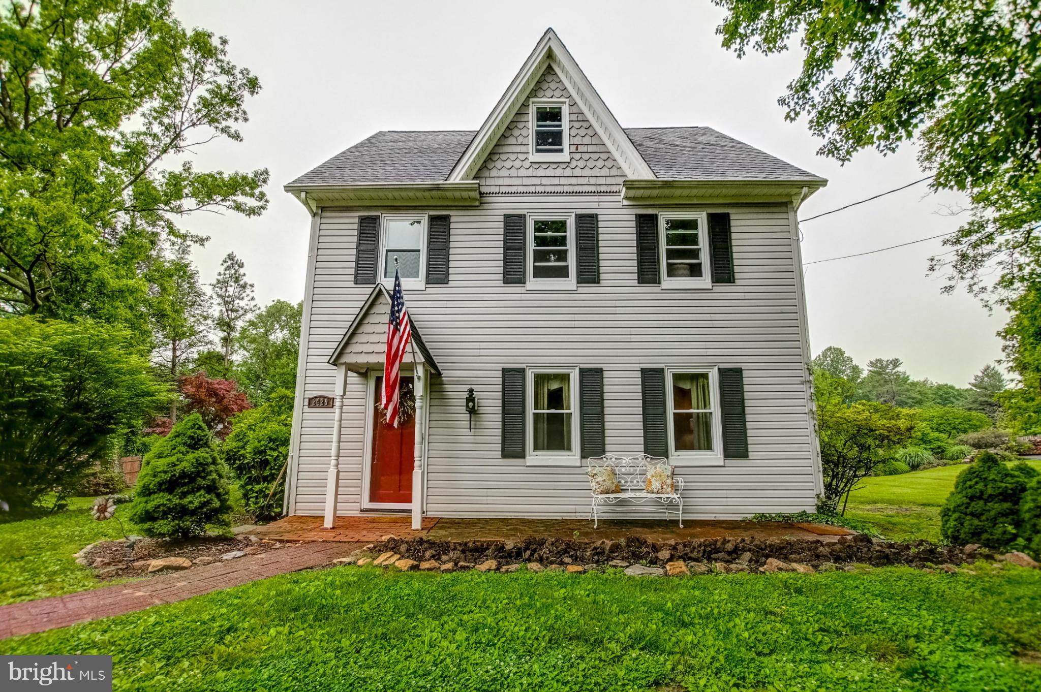 2429 Stanwick Road Phoenix, MD 21131 - Photo 2 of 30 a front view of a house with a yard