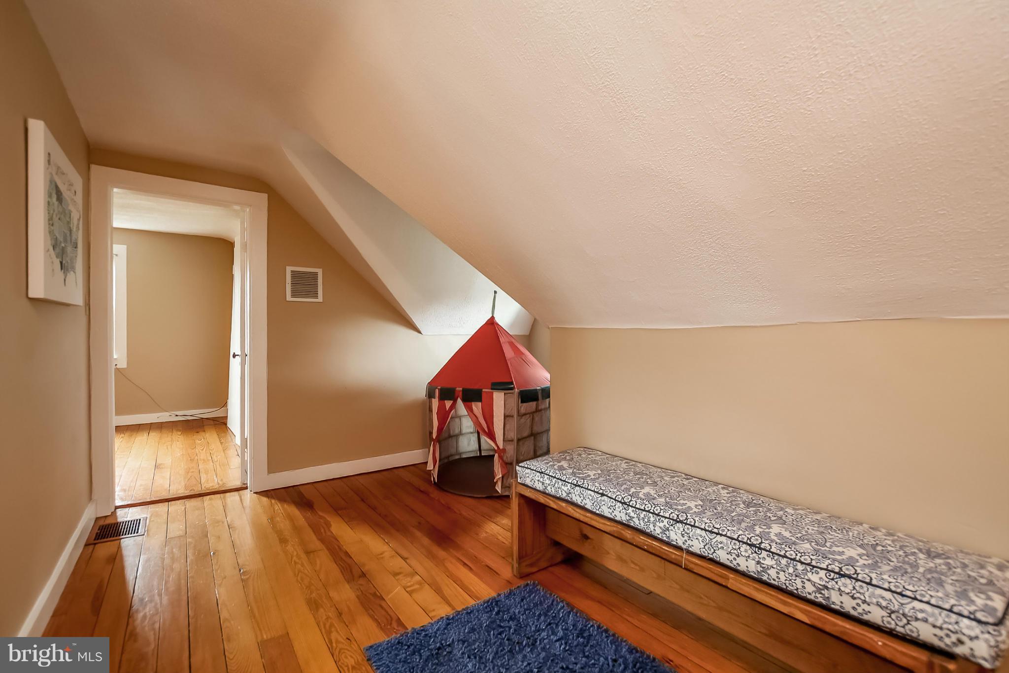 2429 Stanwick Road Phoenix, MD 21131 - Photo 21 of 30 wooden floor in an empty room with a window
