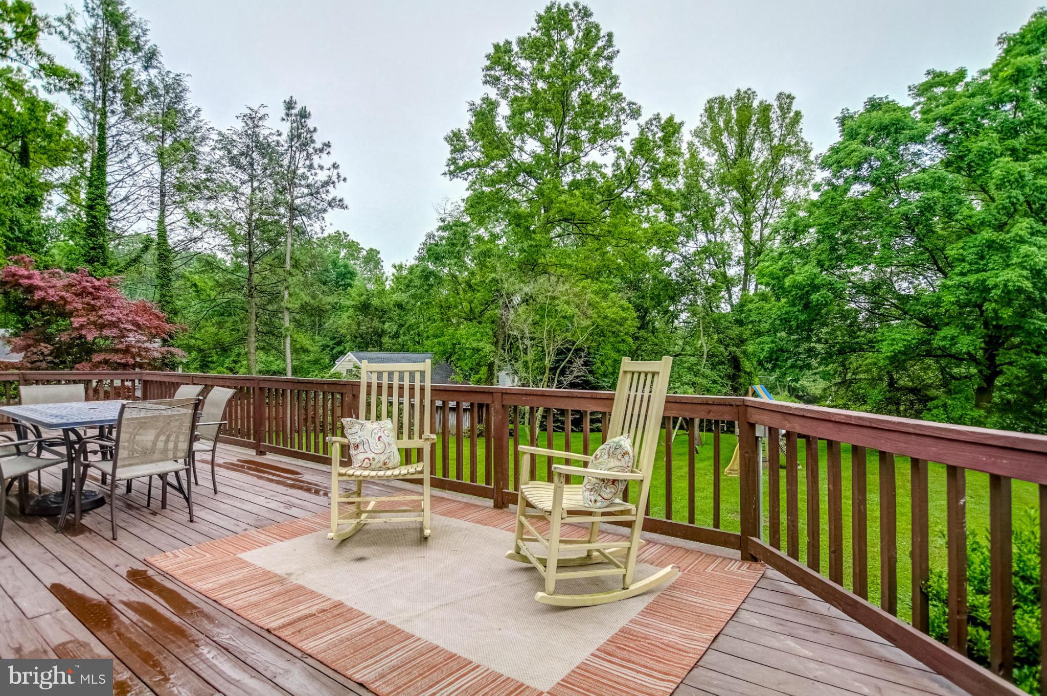 2429 Stanwick Road Phoenix, MD 21131 - Photo 28 of 30 a view of balcony with furniture and trees in the background