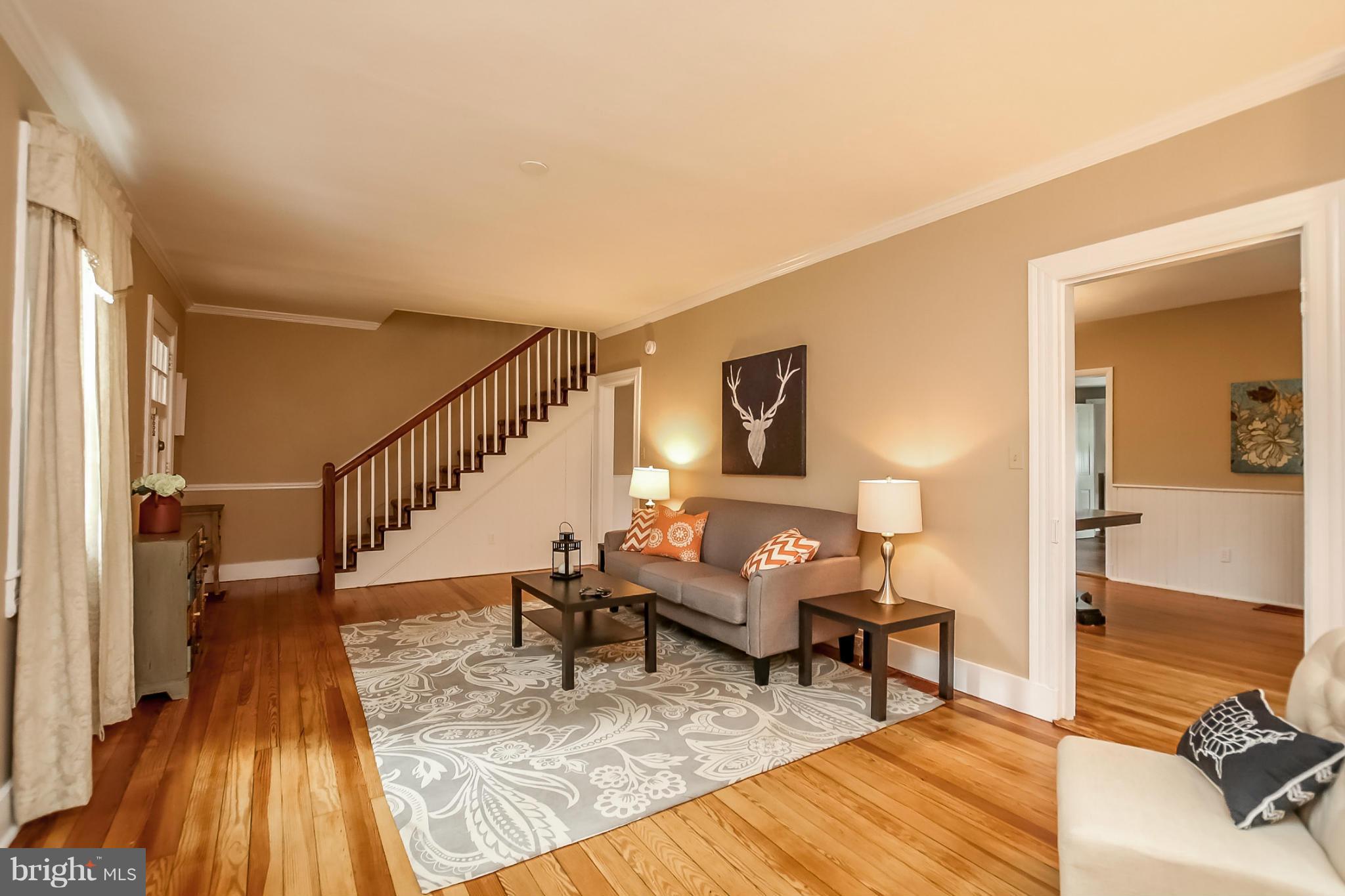 2429 Stanwick Road Phoenix, MD 21131 - Photo 5 of 30 a living room with furniture and a wooden floor