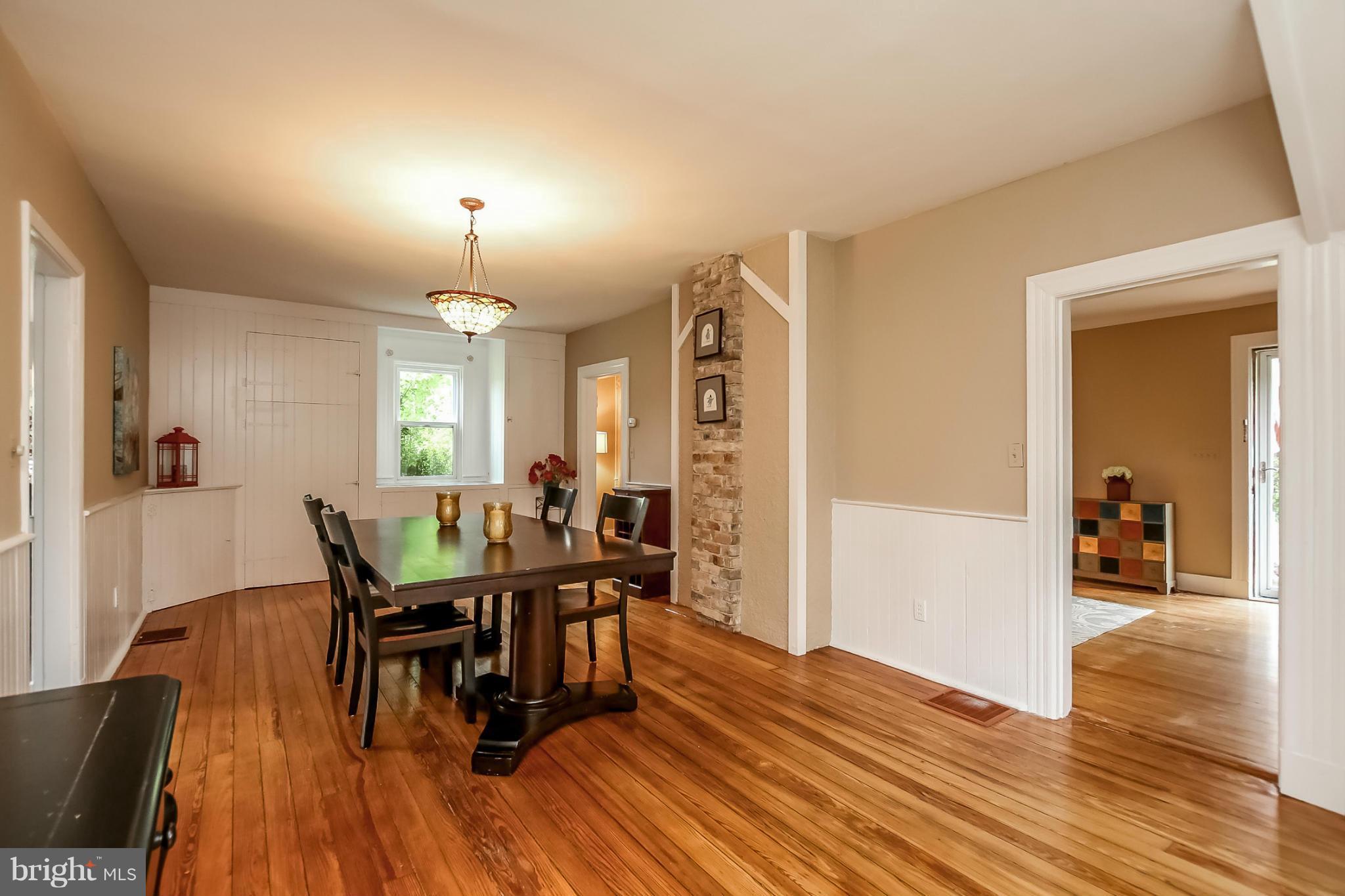 2429 Stanwick Road Phoenix, MD 21131 - Photo 8 of 30 a view of a dining room with furniture and wooden floor