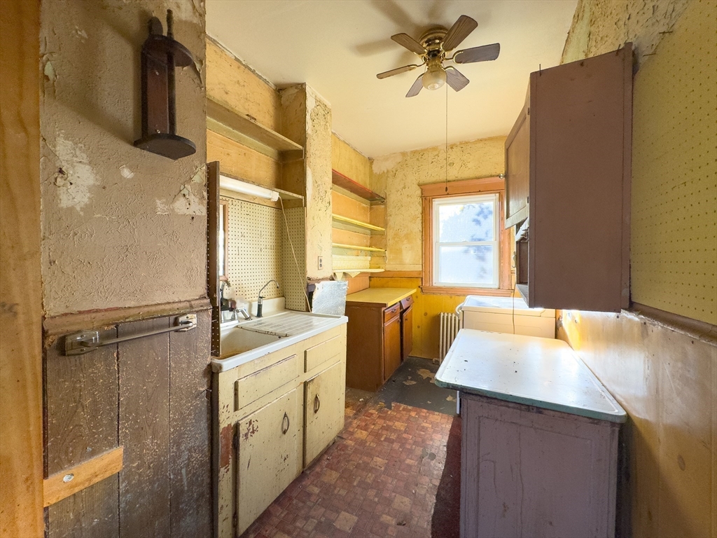 16 Ash Street Fairhaven, MA 02719 - Photo 11 of 25 a large bathroom with a tub a sink and a mirror