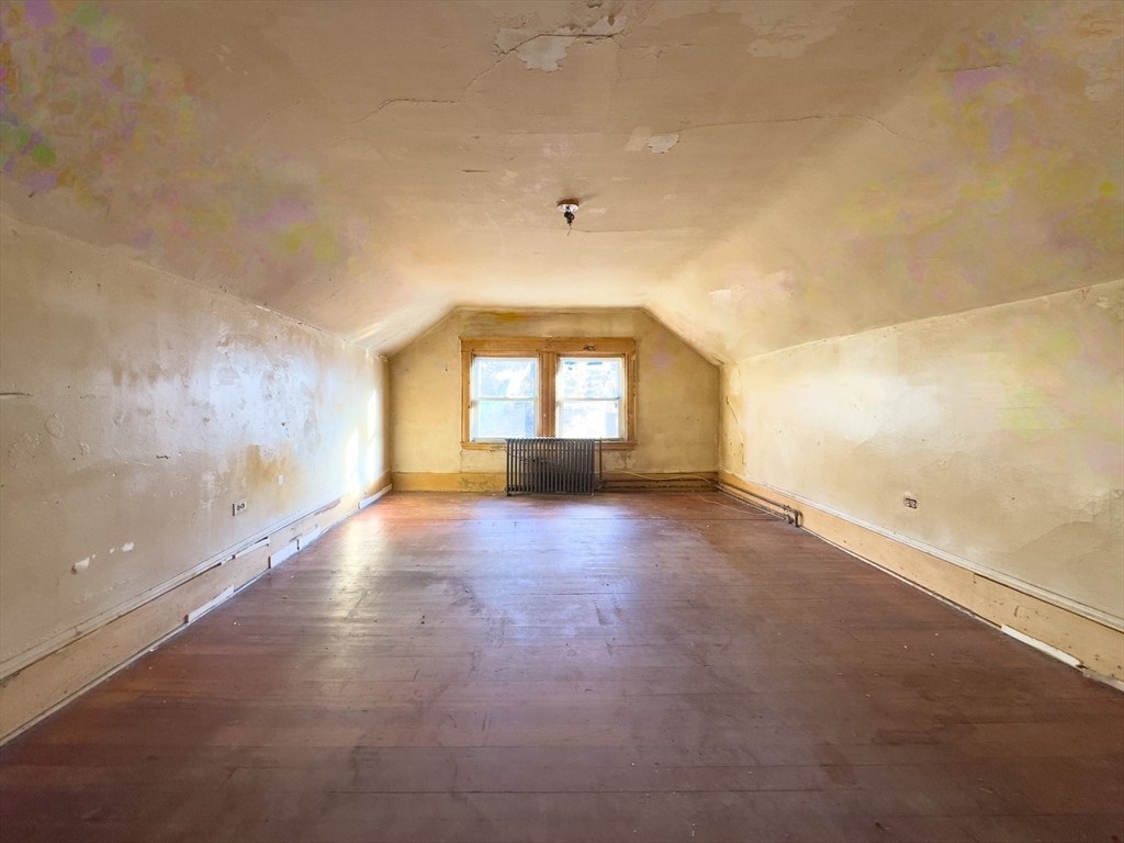 16 Ash Street Fairhaven, MA 02719 - Photo 18 of 25 an empty room with windows and entrance