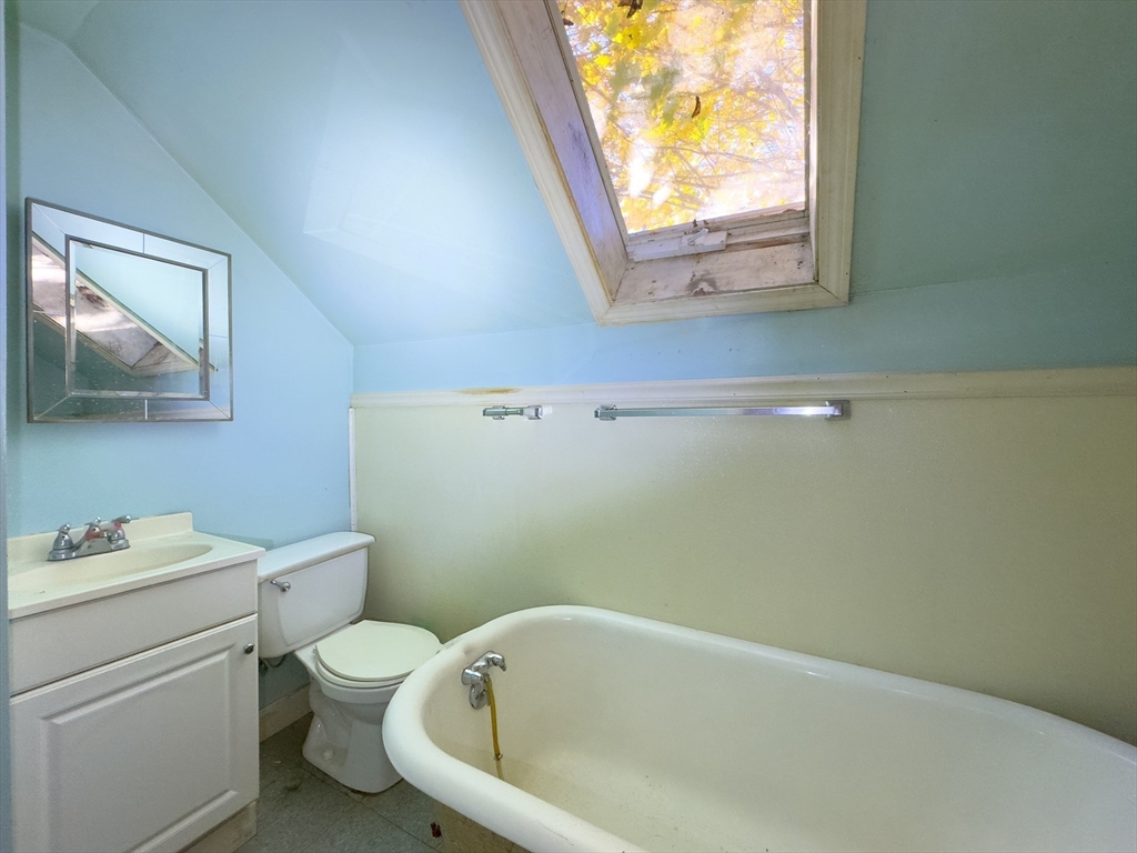 16 Ash Street Fairhaven, MA 02719 - Photo 20 of 25 a bathroom with a sink and a toilet