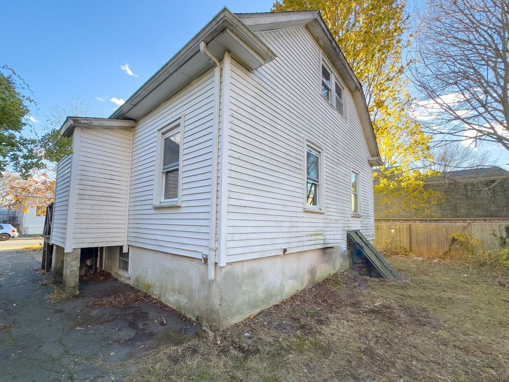 16 Ash Street Fairhaven, MA 02719 - Photo 24 of 25 a view of house with a yard