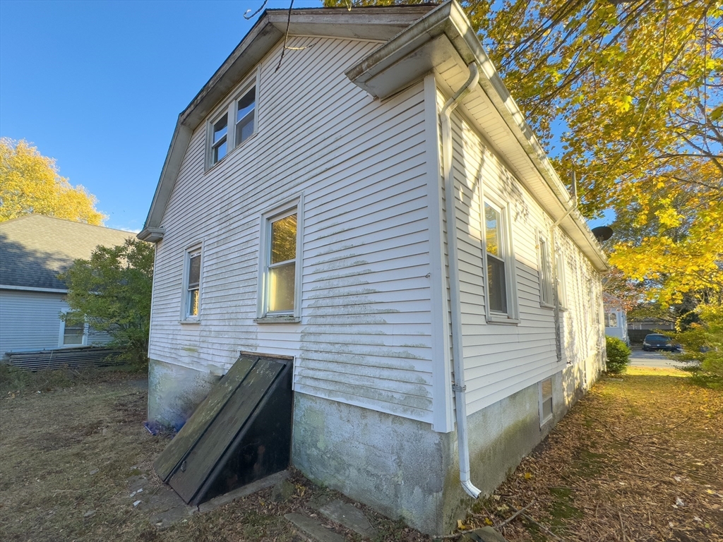 16 Ash Street Fairhaven, MA 02719 - Photo 25 of 25 a view of a house with a yard