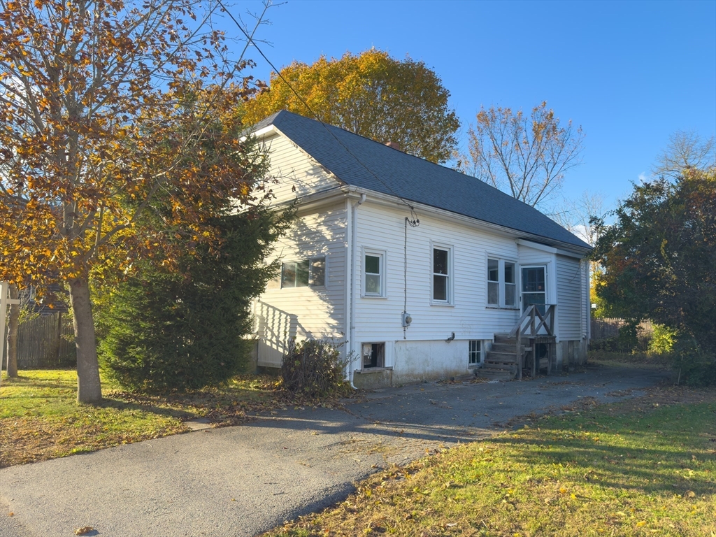 16 Ash Street Fairhaven, MA 02719 - Photo 3 of 25 a view of a house with backyard
