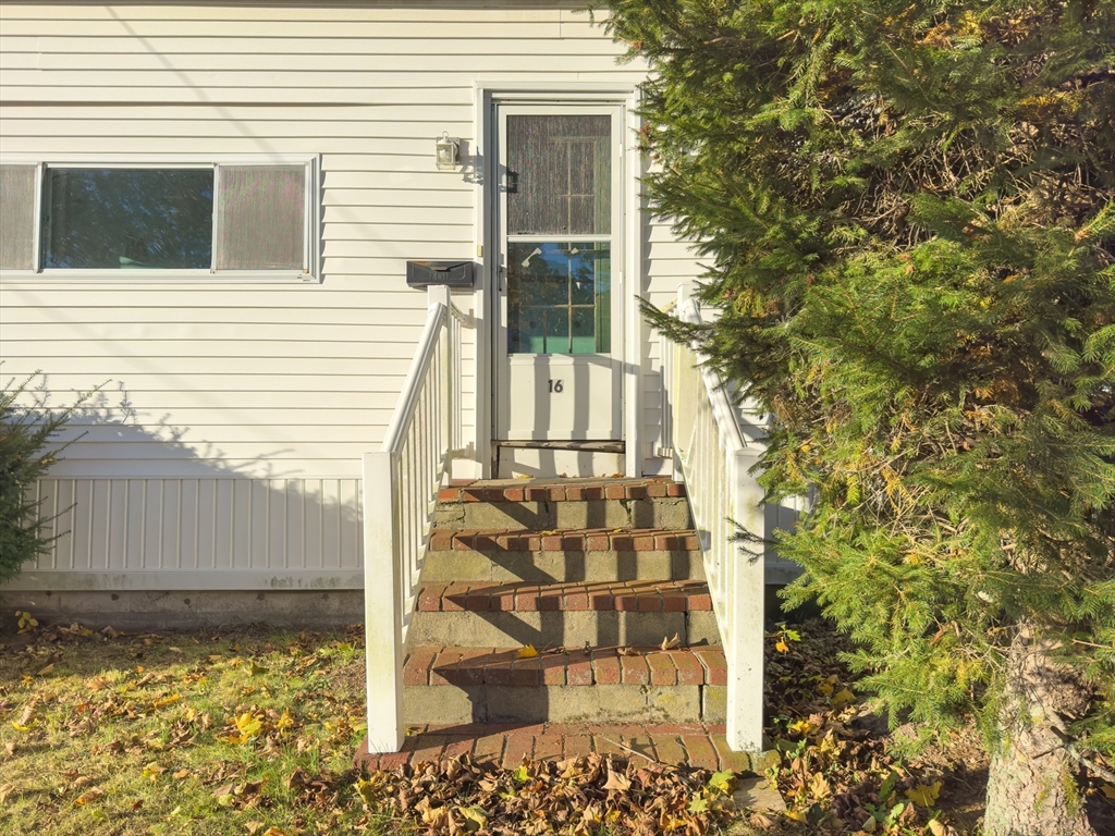 16 Ash Street Fairhaven, MA 02719 - Photo 4 of 25 a view of a door of the house