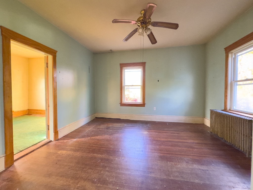 16 Ash Street Fairhaven, MA 02719 - Photo 6 of 25 a view of an empty room with a window
