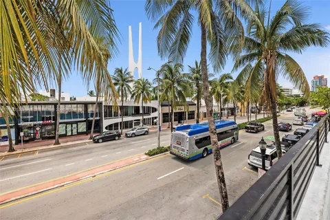 a view of a street with cars