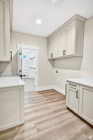 840 South Jones Road Monroe, UT 84754 - Photo 13 of 52 Wood-finish flooring, recessed lighting, shaker-style cabinetry, white countertops, and a door to the walk-in master closet