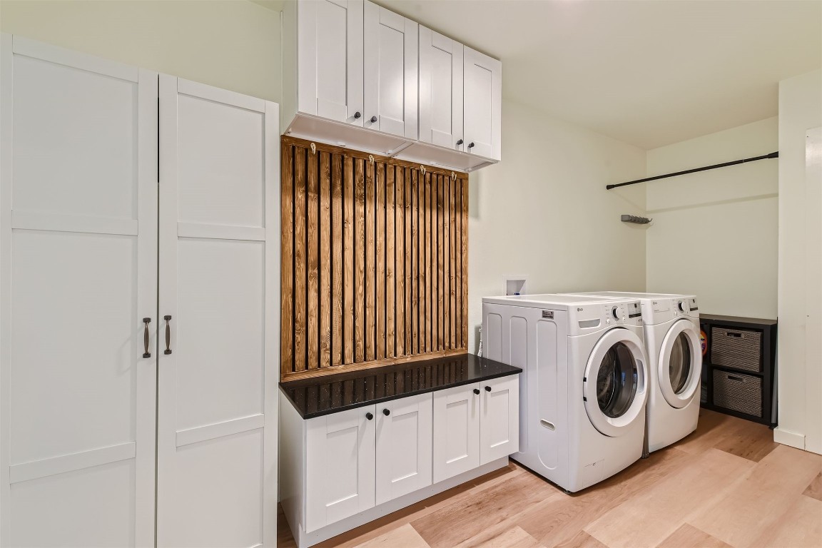 1112 Milford Way Austin, TX 78745 - Photo 19 of 25 a utility room with dryer and washer