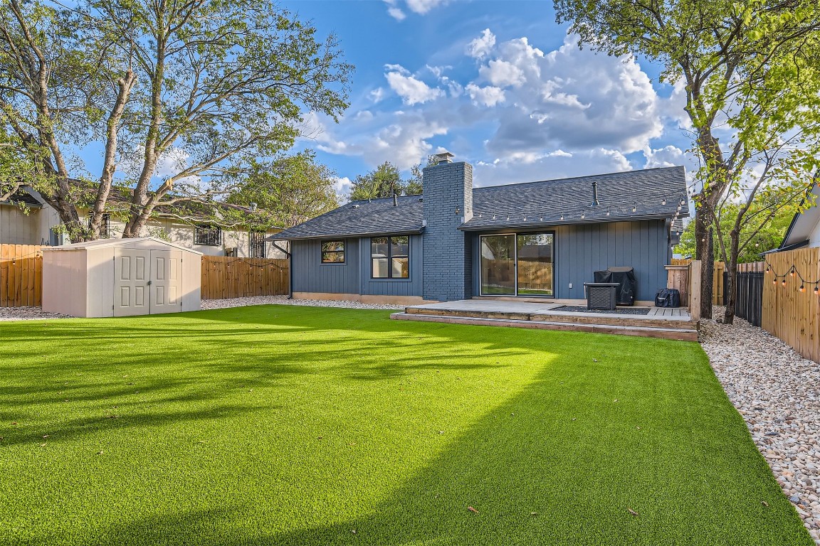 1112 Milford Way Austin, TX 78745 - Photo 24 of 25 a house view with swimming pool and garden space