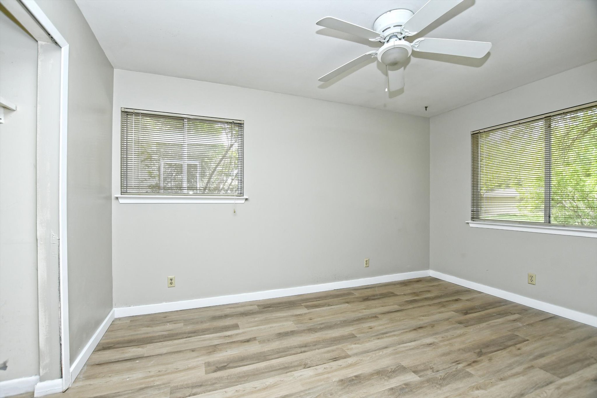 7509 Daugherty Street Austin, TX 78757 - Photo 16 of 24 a view of room with window and ceiling fan