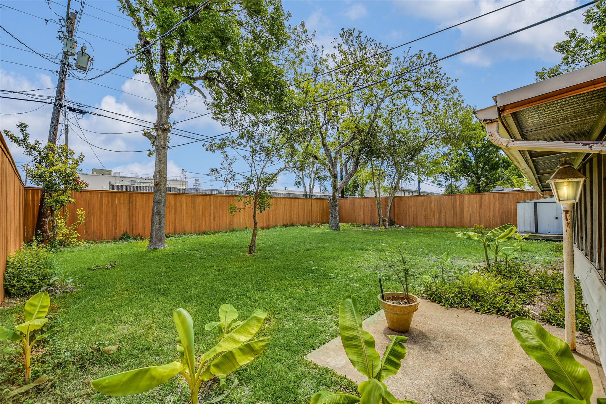 7509 Daugherty Street Austin, TX 78757 - Photo 22 of 24 a view of backyard with seating and green space