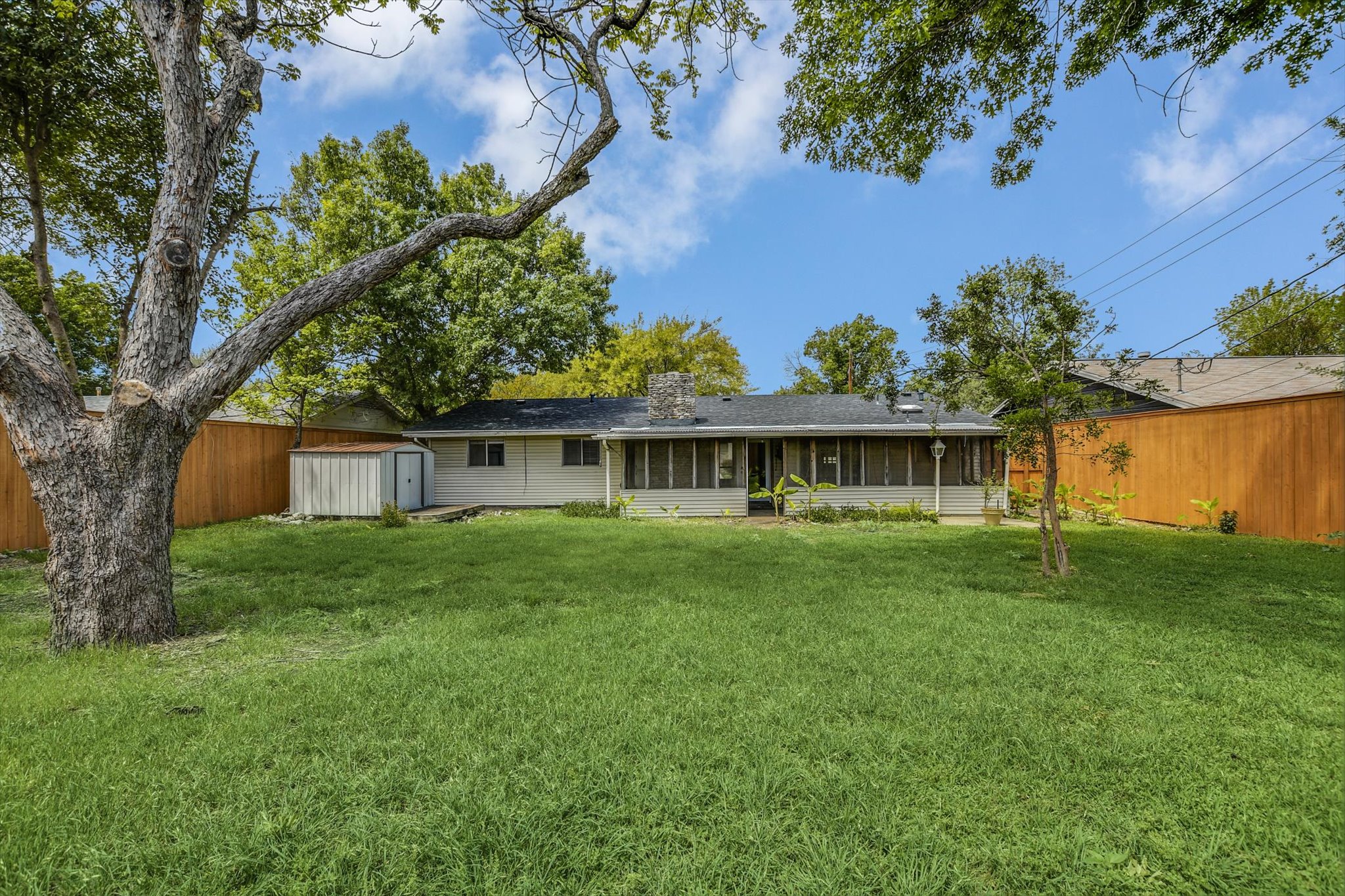 7509 Daugherty Street Austin, TX 78757 - Photo 24 of 24 a view of a house with a big yard