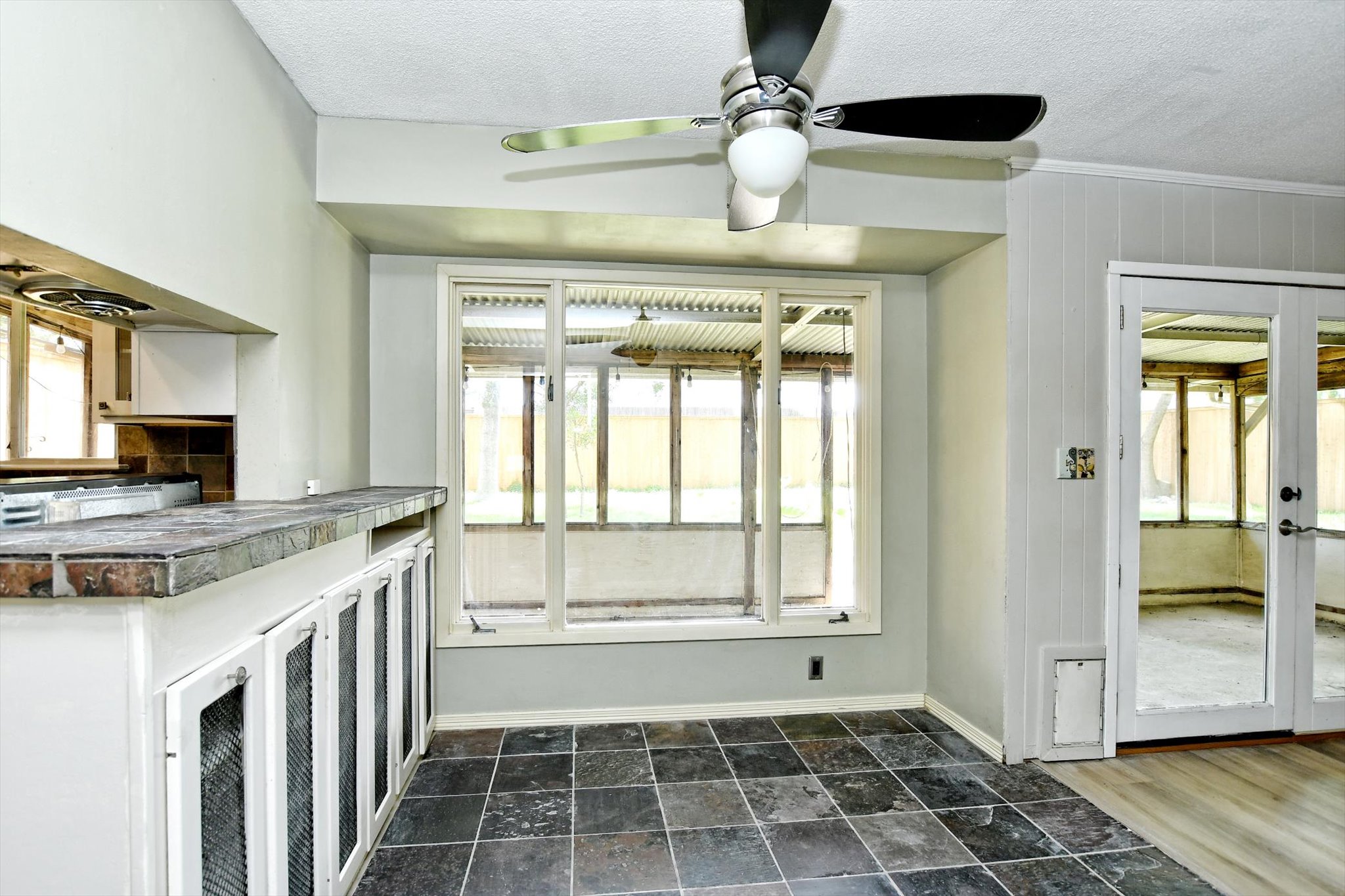 7509 Daugherty Street Austin, TX 78757 - Photo 9 of 24 a view of a kitchen with a sink and a window