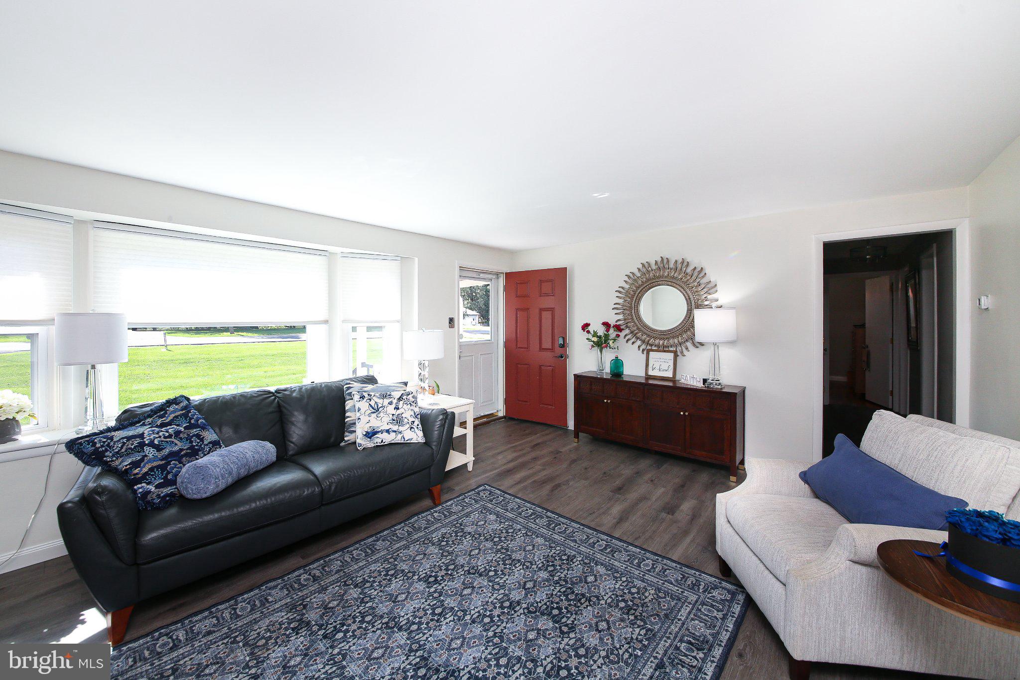 158 South Shady Retreat Road Doylestown, PA 18901 - Photo 18 of 22 a living room with furniture and a couch